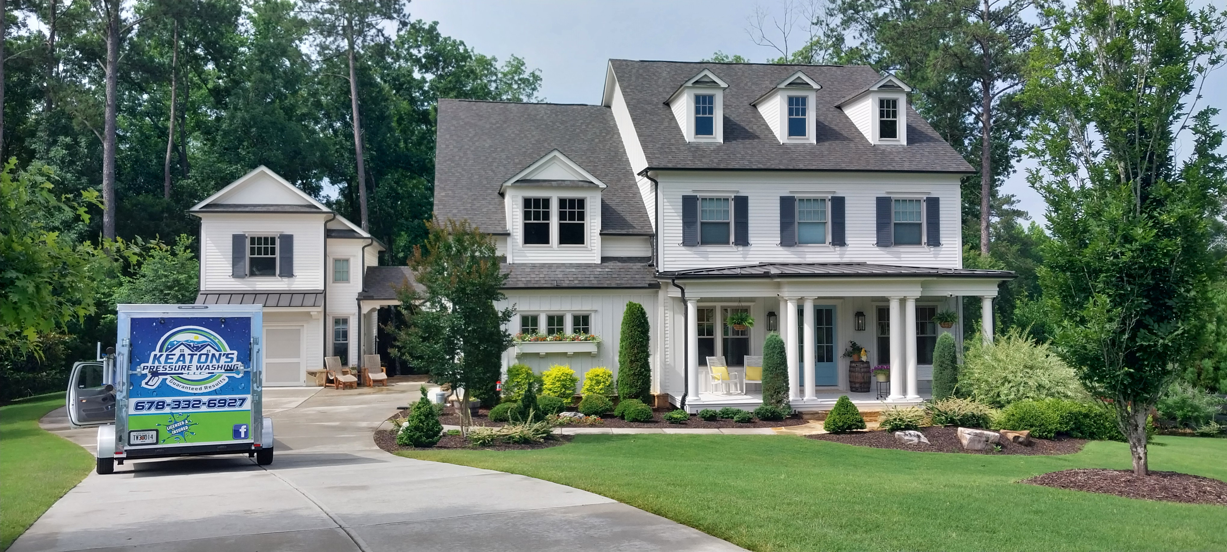 THIS MILTON, GA HOUSE RECEIVED A ROOF CLEANING, HOUSE WASHING AND DRIVEWAY CLEANING